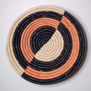 JustOne's black and pink hanging basket handwoven in Uganda