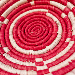 JustOne's red and tan designed basket handwoven in Uganda