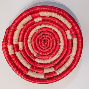 JustOne's small red and tan basket handwoven in Uganda