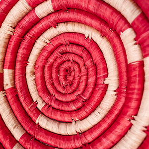 JustOne's small red and tan basket handwoven in Uganda