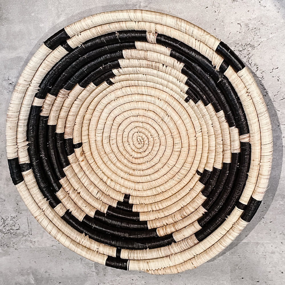 JustOne's tan star basket with black handwoven in Uganda