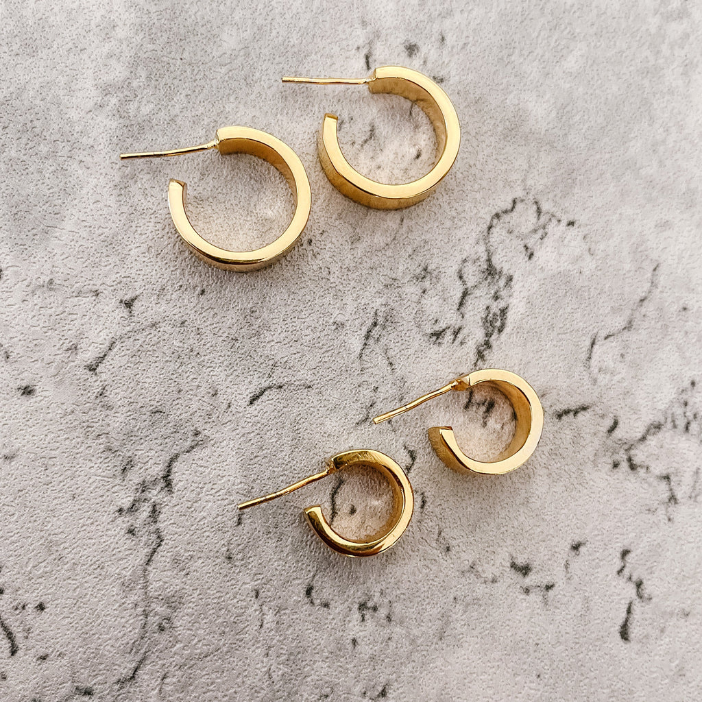 JustOne's brass gold plated small hoops that hug your ear, handcrafted in Kenya