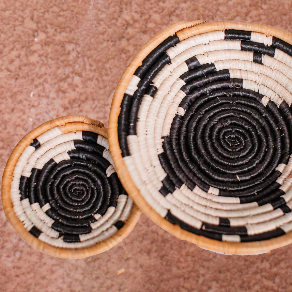 JustOne's black and tan handwoven basket made in Uganda