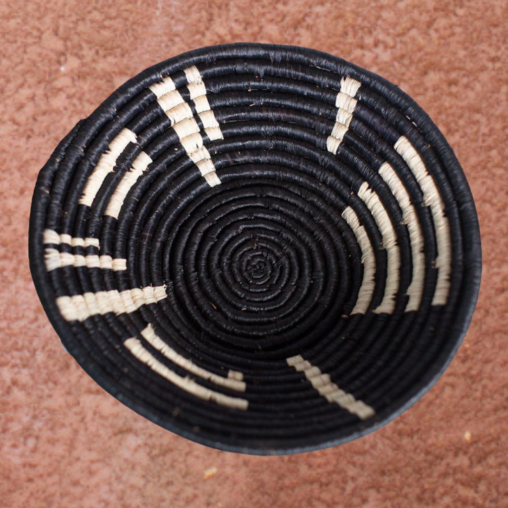 JustOne's black hanging basket with white decals handwoven in Uganda