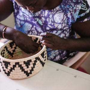 JustOne's deep basket with black and white designs handwoven in Uganda