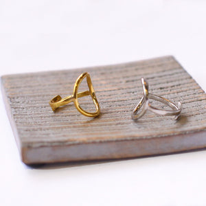 JustOne's brass and silver rings with circle on the front, handcrafted in Kenya