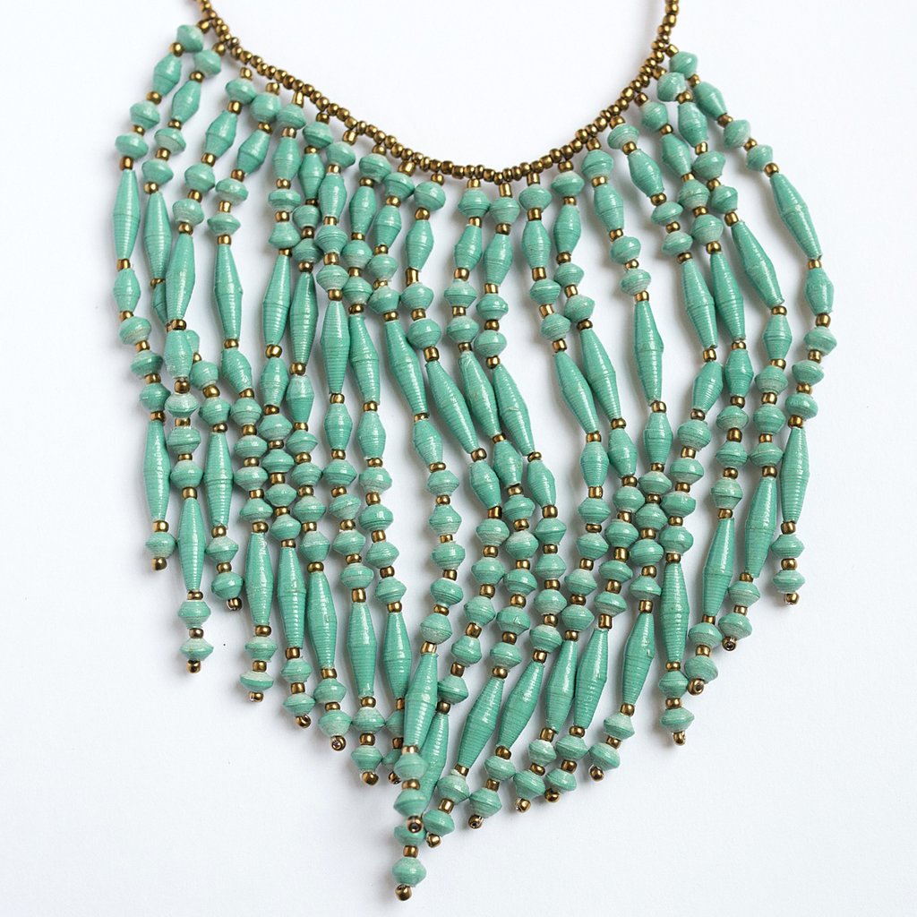 JustOne's necklace with several dangling strings of paper beads in teal, handcrafted in Uganda