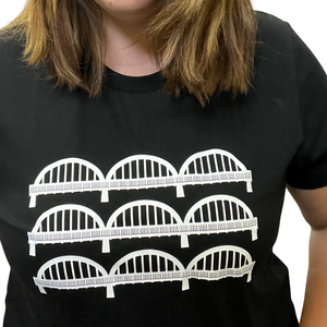 JustOne's black t-shirt with the caledonia bridge in white. The bridge is shown in three rows making a total of nine arches