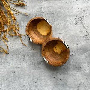 JustOne's wooden double bowl that looks like two circular bowls fused together, handmade in Kenya
